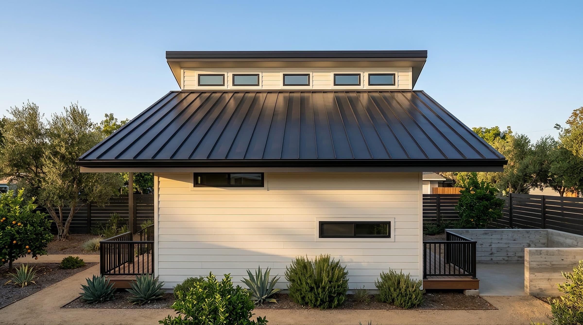 The Grand, a detached two-story LyteMods ADU with a clerestory roofline and covered front porch