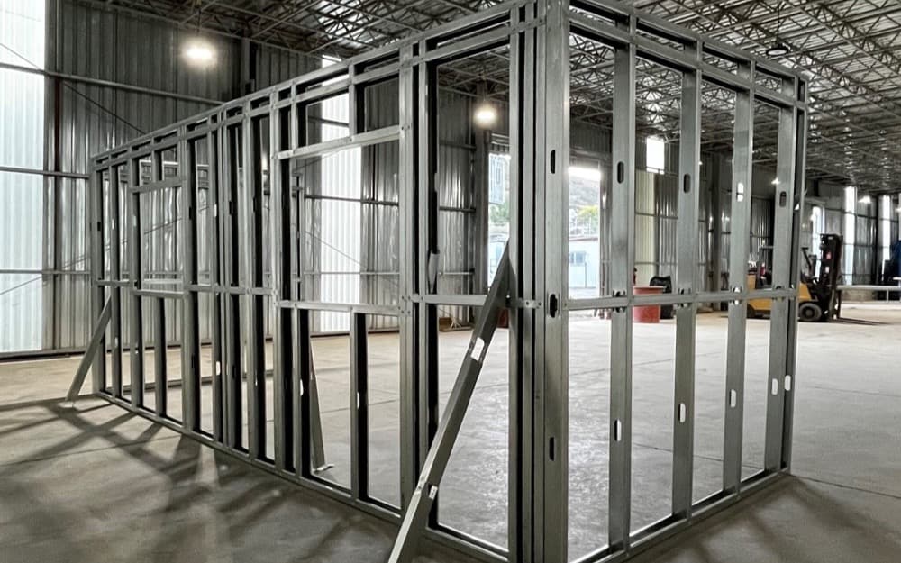 Light-gauge steel wall framing built indoors on the LyteMods factory floor