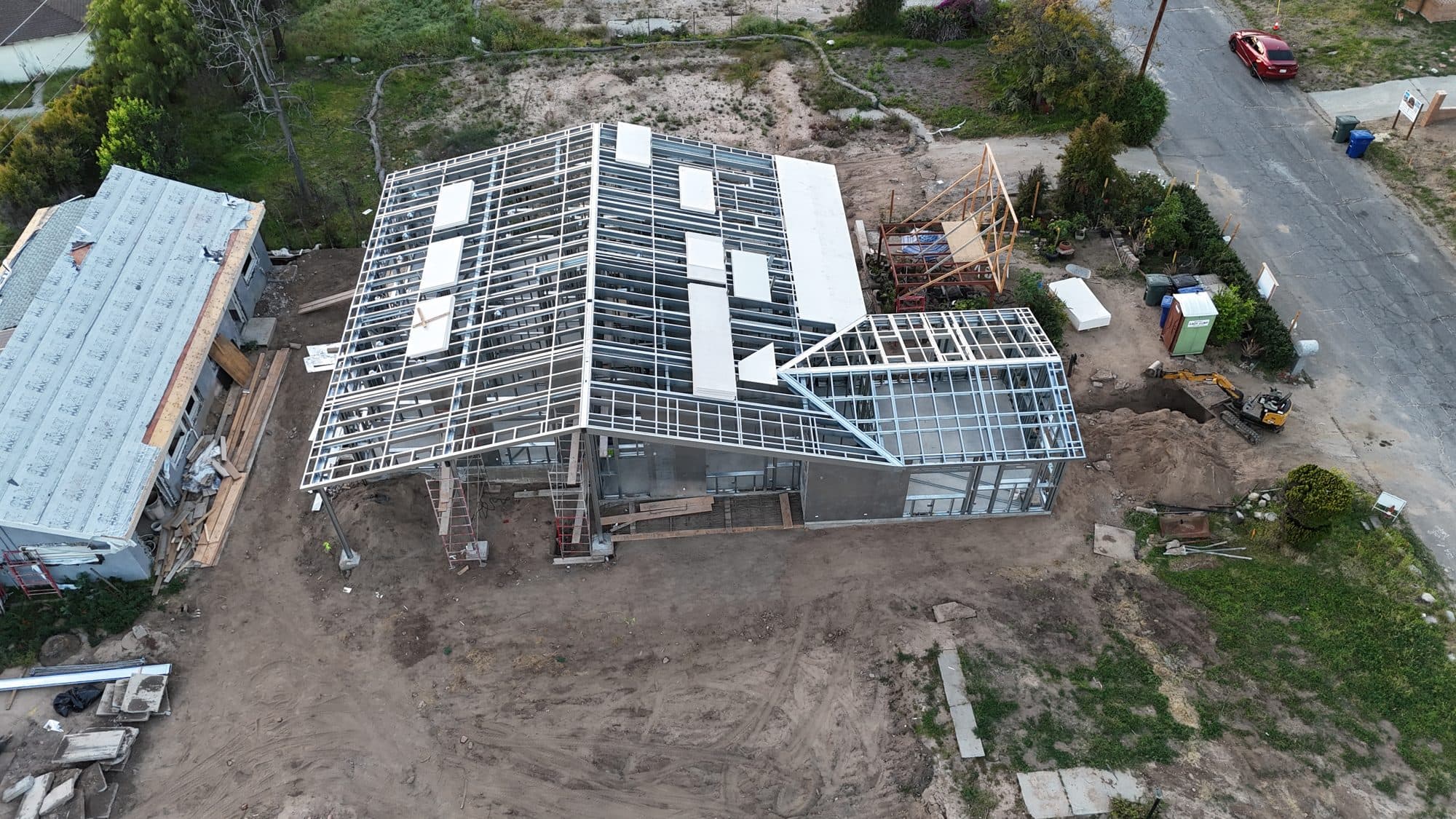 Aerial of the sculptural light-gauge steel roofline at the 480 W Palm rebuild