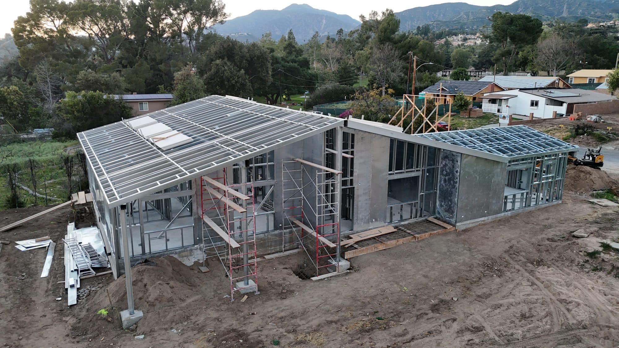 The exposed steel roof structure from above