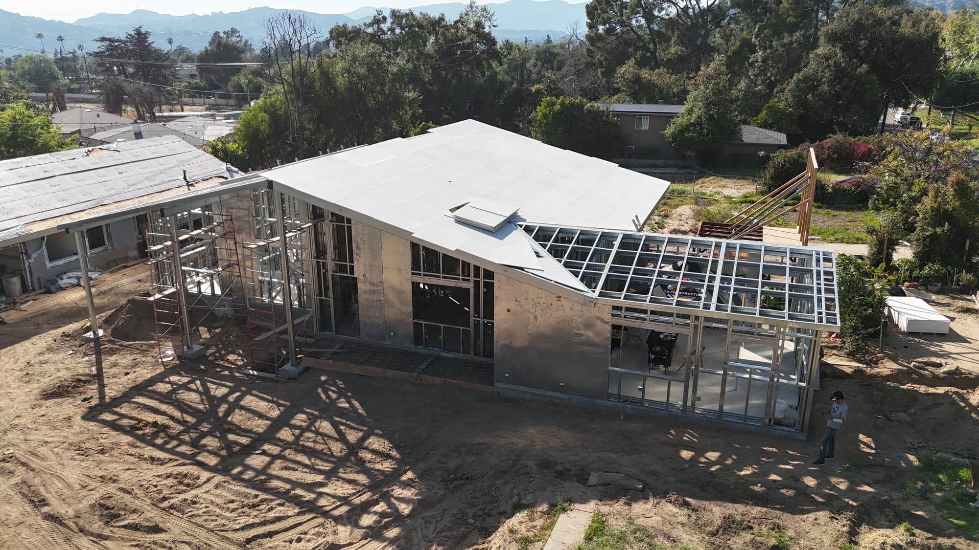 A finished light-gauge steel home frame in daylight